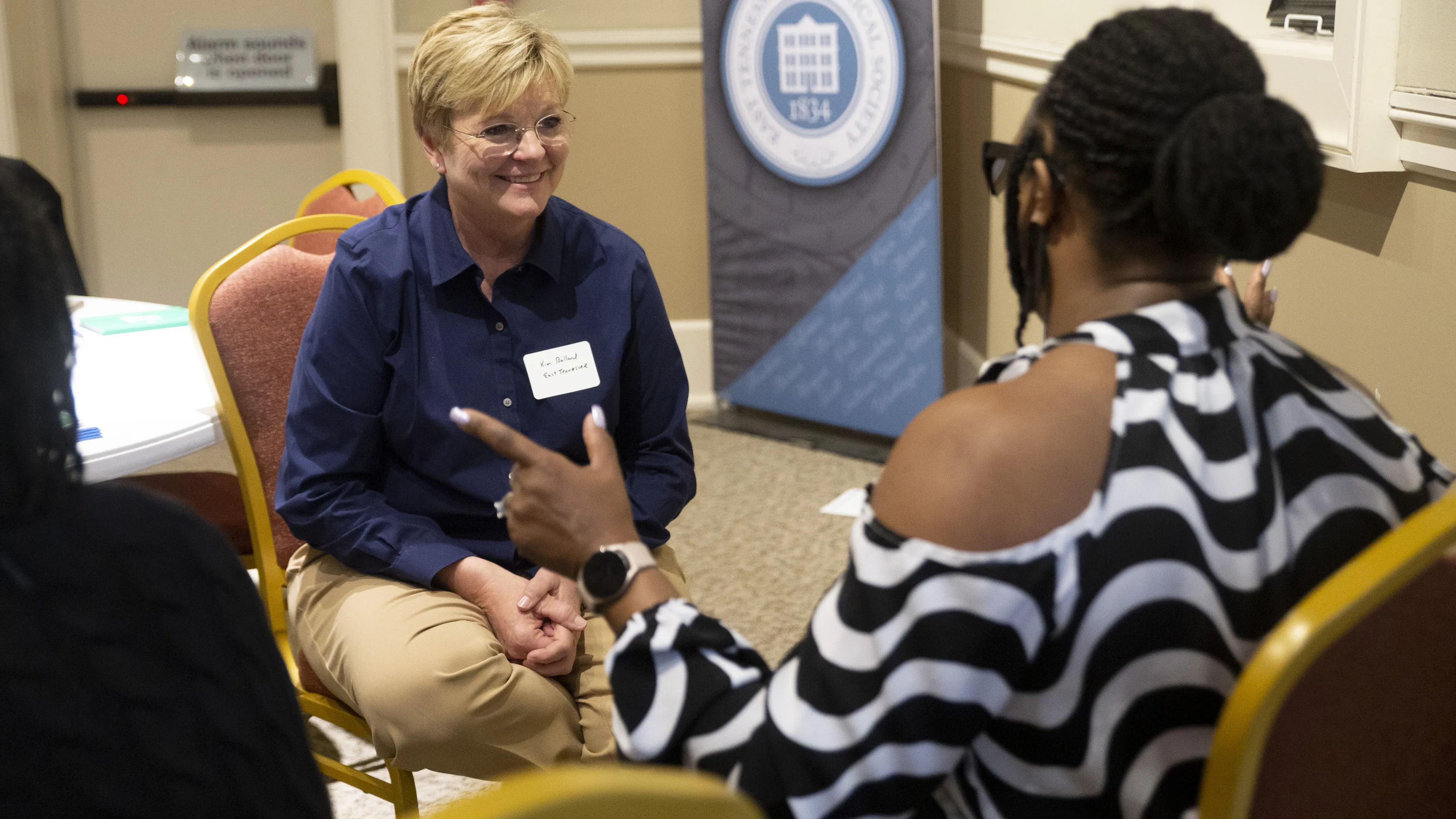 Two YMCA staff have a conversation